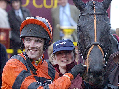 Strong Flow and Ruby Walsh after winning the Hennessy Cognac Gold Cup at Newbury /PA